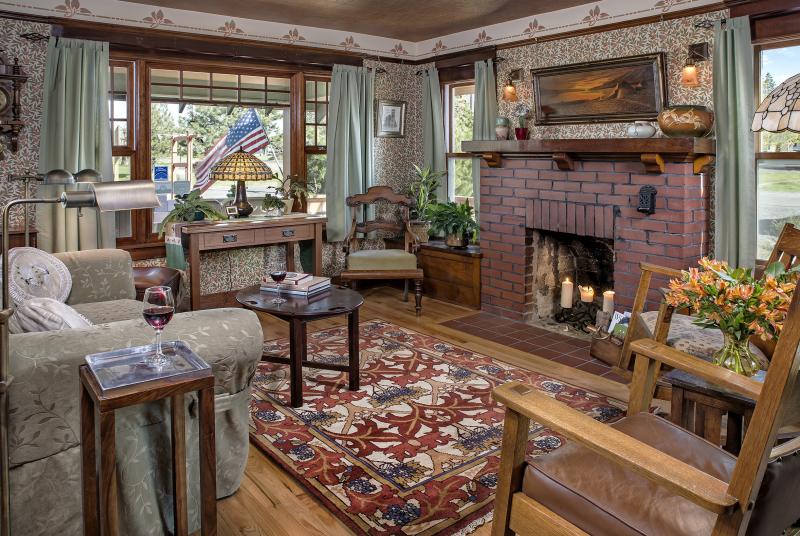 Bronze Antler Bed & Breakfast living room for relaxing, making new friends, enjoying an evening glass of sherry, or maybe ruffing up Madigan's chin, our resident B&B cat. Photo by Unique Angles Photography.